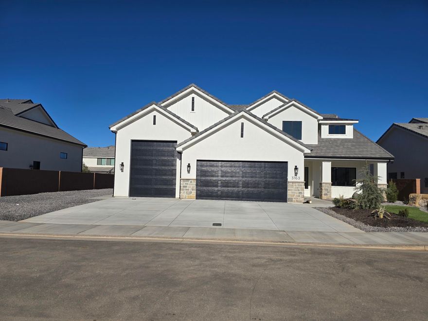 Brand new, stunning home with an RV Garage and RV Parking! Built by B1 Builders. Detailed interior with beautiful finishes. Lots of storage, butler's pantry and 2 laundry rooms. RV Garage measurements - about 30' deep, 15' wide with a 10'x12' garage door.  Full landscape and block walls on three sides included.