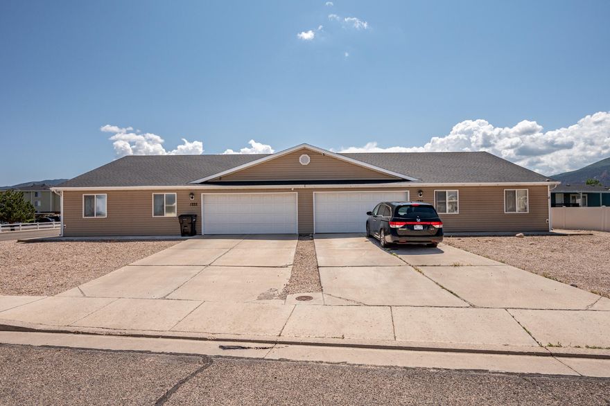 Great well maintained and updated investment property in convenient location near schools, parks and shopping. Great floorplan with a single-level side-by-side design. On a corner lot with large, private fenced and rockscaped yards. This property offers strong rental income and excellent return potential. It is perfect for investors or owner-occupants seeking additional income. Unit 1222 is leased through 3/2026 for $1600/month + $60/month for water.  Unit 1220 is leased through 10/2025 rent is $1645/month + $60/month for water.