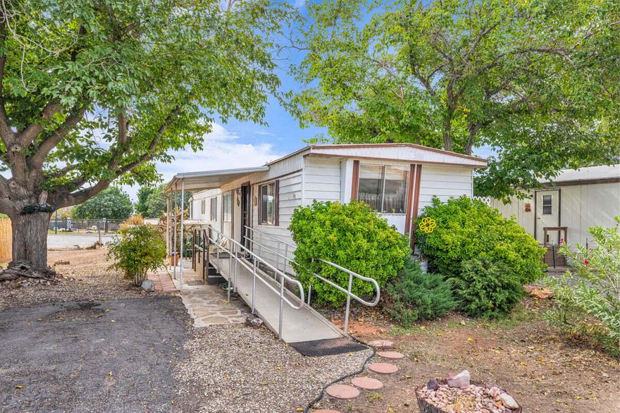 This spacious and exceptionally well-kept 2-bedroom, 1-bath home is nestled in the desirable 55+ community of Pleasant View MHP. Enjoy relaxing mornings or evenings on the charming covered front deck with a convenient ramp, or unwind on the peaceful back deck just steps away from the community dog park. Surrounded by beautiful mature trees providing ample shade, this home offers a serene and welcoming setting. Inside, you'll find a clean and comfortable layout that comes fully furnished, complete with a washer and dryer, truly move-in ready! A storage shed adds extra convenience, and the fantastic central location puts shopping, restaurants, and the post office just minutes away. Easy to show and ready to welcome its next owner! Buyer to verify all information, deemed reliable, however buyer to verify all info including utilities, rental restrictions, and HOA information if applicable.