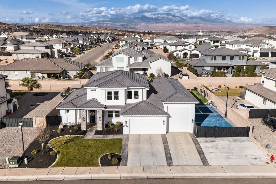 Located in the heart of Little Valley, this one of a kind home delivers an unmatched lifestyle with resort style amenities. The backyard offers a sparkling fenced pool, sport court, putting green, in ground trampoline, and multiple spaces to relax or entertain, creating a true outdoor oasis. Inside, the open and light filled layout offers two spacious primary suites, office/den and a second family room upstairs. The heart of the home is a beautifully designed kitchen featuring an oversized island, quartz countertops, custom cabinetry and walk in pantry. The main level primary bedroom includes an ensuite bath with double vanities, soaking tub, walk in shower and spacious walk in closet. The expansive RV/boat garage provides exceptional space for storage, gym or golf simulator.