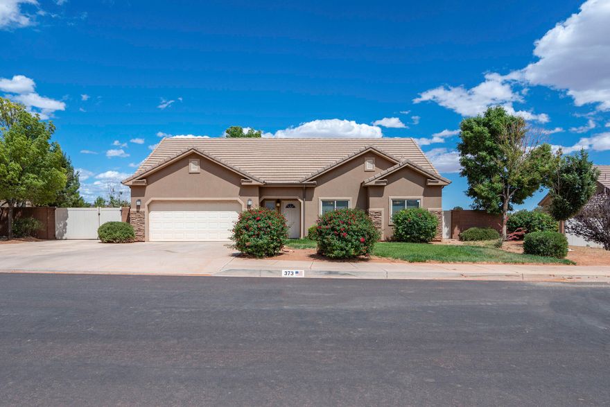 Red Mountain Views!! Set against the breathtaking red rock backdrop of Ivins, this beautifully maintained 3 bedroom, 2 bathroom home captures some of the most stunning views of Red Mountain. From sunrise to sunset, the vibrant cliffs create a dramatic and ever changing landscape right outside your door, truly a highlight of this property.
Perfectly positioned to embrace Southern Utah's natural beauty, this home offers seamless indoor-outdoor living which includes a dedicated and spacious RV parking for all of your recreaction toys or extra parking. The spacious, private backyard is framed by fresh, brand new landscaping and features a covered patio ideal for relaxing or entertaining while taking in the incredible scenery. Inside, the home features new paint, updated appliances, and tile flooring throughout. The unfinished upstairs provides a rare opportunity to expand and add value, for additional living space, a guest suite, or a bonus room. Located in a quiet, friendly, and serene neighborhood, you'll enjoy easy access to Snow Canyon State Park for world class hiking, biking, and exploration, as well as nearby Tuacahn Center for the Arts for outdoor entertainment. A neighborhood park just minutes away adds even more appeal for families and guests. Whether you are searching for a full-time residence, second home, or investment property, this home offers a rare combination of comfort, creation, and unforgettable red rock views.