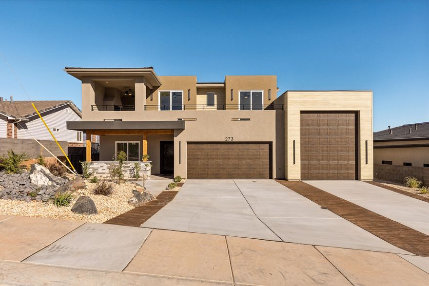 **Seller Offering $20k Toward Buyer Concessions** Experience luxury desert living at its finest in this stunning new construction home located in the exclusive Falcon Ridge community of Hurricane, Utah. Designed for modern comfort and style, this 2,993 sq ft residence seamlessly blends contemporary architecture with breathtaking mountain views and resort-style amenities.

Step inside to an open-concept living space with large windows, designer finishes, and spacious decks extending from multiple bedrooms—perfect for taking in the desert sunsets. The gourmet kitchen boasts premium appliances, custom cabinetry, and a large island ideal for entertaining. Featuring 6 bedrooms (or 5 plus an office), 3 full bathrooms, and a powder room, this home offers flexibility for families, guests, or remote work. Outside, enjoy the ultimate backyard retreat complete with a covered deck and outdoor fireplace, a sparkling pool, and a private putting green, all surrounded by a fully landscaped yard.

Car enthusiasts will love the oversized 2-car garage plus RV garage (1,207 sq ft total)perfect for storing toys and gear for nearby adventures in Zion and Sand Hollow.

This is more than a homeit's a modern desert sanctuary built for luxury, leisure, and lasting memories.