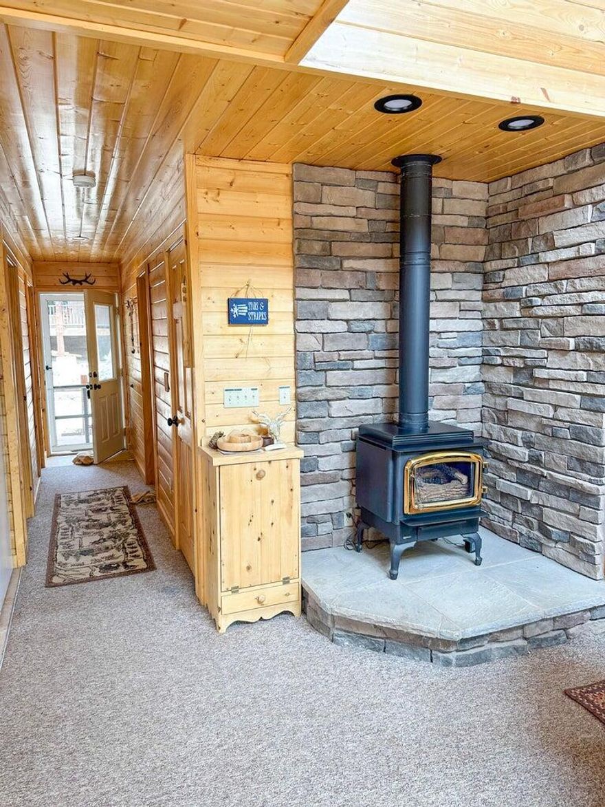 Escape to the Duck Creek area in this furnished mountain cabin, with a reservoir nearby for added recreation and enjoyment. This inviting retreat features 2 bedrooms, a loft with a futon, warm wood finishes, a cozy stove, a functional kitchen, an outdoor firepit area, and a storage shed, creating an ideal basecamp for year-round use. Sale includes the side-by-side, along with most furniture, fixtures, linens, and silverware, making this a convenient turnkey opportunity. Telescope is excluded. Additional ATV in the shed may be available for purchase separately outside of closing. Buyer to verify all information, including but not limited to HOA dues, amenities and intended use.