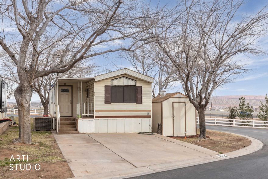 Charming 540 sq ft home located in a desirable 55+ community in Washington City. Recently refreshed with brand-new flooring throughout, this home offers low-maintenance living at its best. HOA includes clubhouse access, fitness center, pool, hot tub, garbage service, and full yard maintenance. Enjoy comfort, convenience, and an active lifestyle all in one great location! The lot is incuded in this purchase.