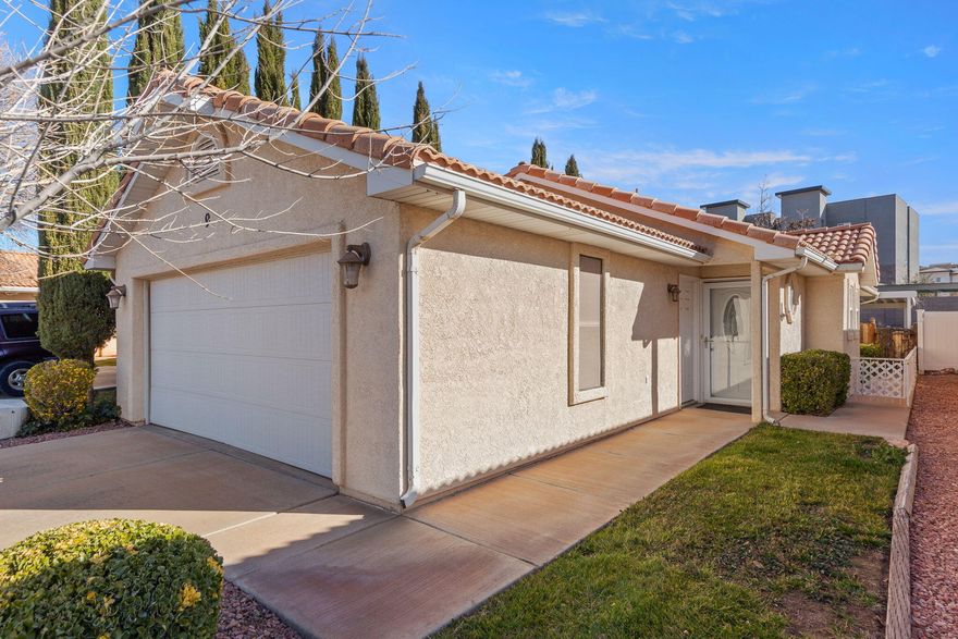 ***Special Pricing*** PRICED TO MOVE!  Cute 2-bed, 2-bath home with a 2-car garage in a quiet 55+ community with great amenities and a LOW HOA. Features newer carpet, newer water heater, large covered patio with a private backyard. Community includes a clubhouse, pool, exercise room, and more. Conveniently located near shopping, dining, trails, and quick access to I-15. Home is priced for a quick sale—seller is not messing around. This is your chance. Don't wait... this one will not last!