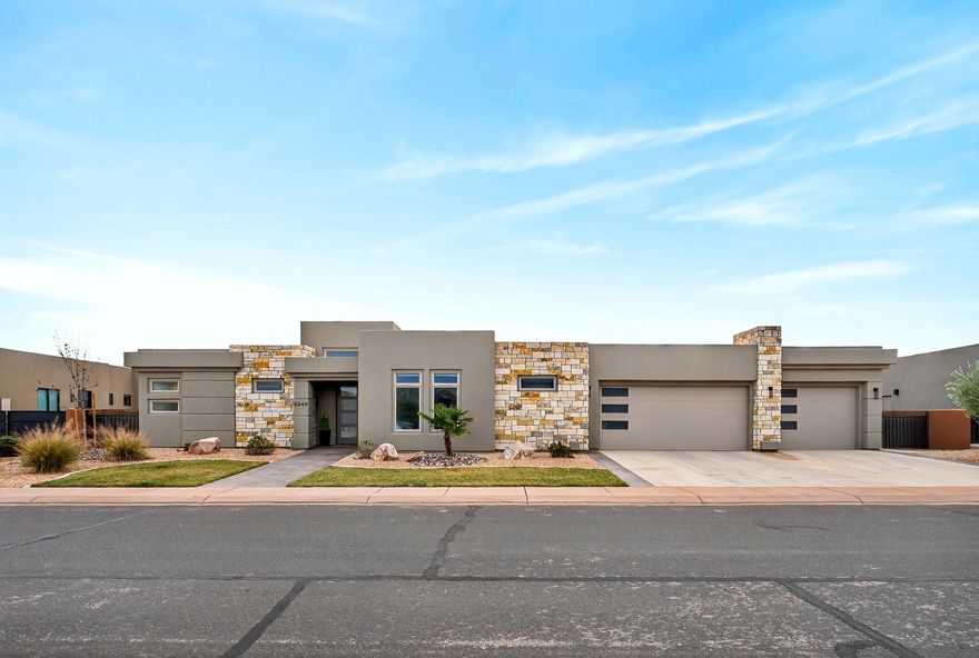 Live where others vacation. Located in The Dunes at Sand Hollow Resort, this spacious, well-maintained 4-bedroom,2.5-bath home is being sold fully furnished, offering true move-in readiness and effortless resort-style living. Whether you're seeking a primary residence or the perfect Southern Utah retreat, this home delivers both comfort and convenience.

The open-concept kitchen flows seamlessly into the expansive family room, creating an ideal space for entertaining or unwinding after a day outdoors. The generously sized primary suite features a spa-inspired ensuite with a garden tub and separate shower. Flexible secondary bedrooms provide options for guests, hobbies, or a dedicated home office.
An extra-deep garage with 8-foot doors offers ample room for boats, side-by-sides, and all your adventure gear. The fully enclosed backyard is professionally landscaped for low-maintenance living.

Enjoy quick access to Sand Hollow Reservoir, championship golf at Sand Hollow Golf Course, miles of scenic desert trails, and approximately 24 miles to Zion National Park. Here, you're at the center of Southern Utah's most sought-after recreation -- while still enjoying the peace of a quiet residential setting.