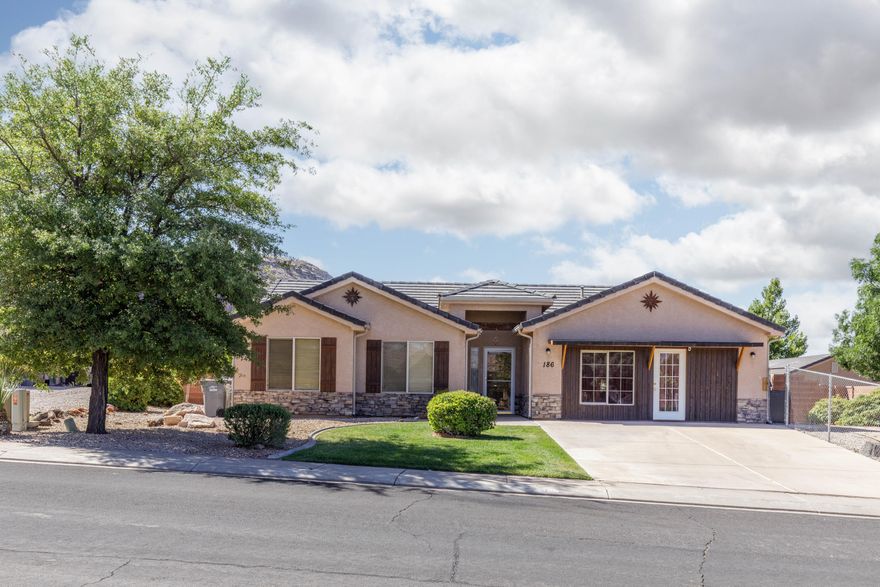 Exceptional Turn-Key STR Property with Expansion & Dual-Living Opportunity - Grandfathered Permit Included

Welcome to one of the rare gems in La Verkin, Utahâ€”a fully-furnished, turn-key short-term rental property with a grandfathered-in STR permitâ€”a highly coveted feature in a town that no longer issues new permits.

This profitable property has consistently outperformed long-term rental returns for over eight years, with minimal effort and a single listing on Airbnb. A motivated investor has the opportunity to significantly boost revenue by marketing it across multiple platforms like VRBO, Booking.com, and even launching a dedicated website to maximize visibility and occupancy rates.

Originally a 1,440 sq ft home, the property was thoughtfully expanded by converting the garage into an additional kitchen and living room, adding over 400 square feet of permitted living space. It now boasts a total of 1,911 square feet, complete with a certificate of occupancy and full documentation to satisfy any lender or appraiser.

This smart layout allows the property to function in multiple ways:

Live-in investors can reside in the one-bedroom apartment side while renting out the main portion of the home, covering expenses and generating income.

Alternatively, it can be fully opened up and rented as a spacious single unitoffering maximum occupancy and return potential.

Furniture, appliances, and supplies can be included tomake this a true turn-key investment from day one.

Nestled in the heart of Southern Utah, this property is a top pick for travelers visiting world-class destinations such as:

Zion National Park (20 minutes away)

Bryce Canyon

The Grand Canyon

Kolob Reservoir

Sand Hollow State Park

And La Verkin's own Virgin River and natural hot springs known as The Pools

With tourism booming and La Verkin's STR permits capped, this is a rare opportunity to own a high-performing asset in a rapidly appreciating market. Whether you're a seasoned investor or just starting out, this property offers flexibility, profitability, and long-term upside.

This property is an active Short-Term Rental with ongoing guest reservations. Showings must be scheduled in advance to avoid disturbing guests. Please contact the listing agent to coordinate a viewing time. Keypad code will be provided upon confirmation of the appointment.

Garage capacity and related details are provided for informational purposes only. The garage was legally converted into livable space with permits and a certificate of occupancy, increasing the home to 1,911 sq ft. Should an interested party wish to revert the property back to its original 1,440 sq ft configuration, the garage space could potentially be restoredthough this would eliminate the permitted additional living area. All documentation is available upon request.