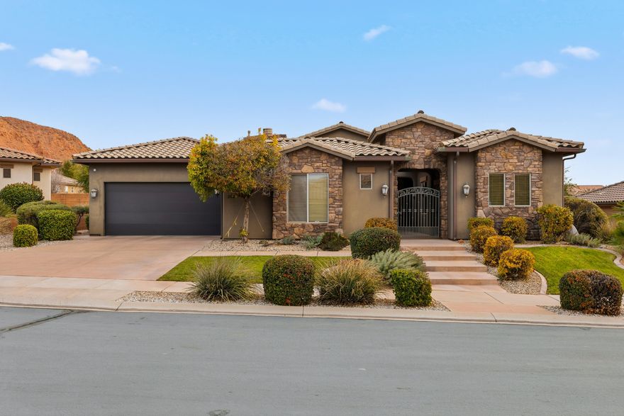 Welcome to your dream home at 306 N Eagle Cove, where luxury living meets breathtaking mountain views! This stunning 4 bedroom, 4.5 bath sanctuary offers a remarkable blend of elegance and comfort. Imagine waking up every day to stunning red rock mountain vistas, which you can enjoy from your private courtyard oasis or the luxurious tiered pool and spa. Step inside and be greeted by an inviting archway that seamlessly connects the grand living spaces, perfect for hosting unforgettable gatherings or cozy nights in. The gourmet kitchen boasts granite countertops, complemented by stainless steel appliances. Picture yourself enjoying morning breakfast on your expansive covered patio. This home is more than just a place to live. It's a lifestyle. Don't wait—homes like this don't last long.