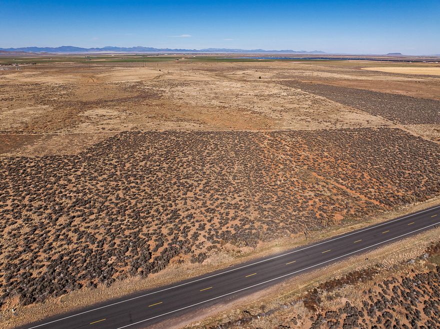 2.21 Acres in Enterprise with Water Right & Quiet Country Living!
Looking for space, freedom, and flexibility? This 2.21-acre parcel in Enterprise offers plenty of room for livestock, gardens, or your next home project in Southern Utah. With wide-open views and a peaceful rural setting, it's the ideal spot to create your own retreat away from the rush. Zoned Ag-20 and located within Washington County, this property allows a range of permitted uses. The new buyer will apply for a septic permit through SW Utah Health. Natural gas lines run in front of the property. Communication lines are close by (if desired). Ask agent about sellers correspondence with the power department. Off grid living is also possible and a much desired opportunity in this area. Survey corners markers are in all corners and easy to find. 
 
The sellers are including 1 acre-foot of water with right #71-5993 with a priority date of 1945. The water district is currently processing a change application to assign this right to the parcelonce approved, buyers will receive well-drilling cards and one can rock and roll right away to drill for a well. (Contact agents for updates on application status.)
 
This parcel offers both function and flexibilityready for your ideas, animals, and future home.