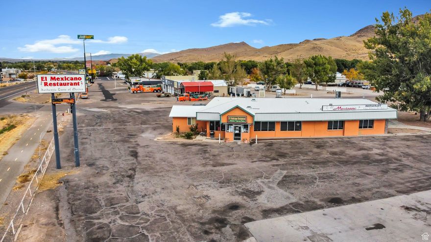 Turnkey Commercial Building | Prime I-70 Frontage | Salina, Utah Position your next venture for success with this high-visibility commercial property located just off Interstate 70 in Salina, Utah. Sitting on 1.21 acres with a south-facing front, this 4,593 sq ft building was constructed in 1976 and has been exceptionally maintained. Currently operating as a restaurant, the property features a highly functional layout ideal for food service, retail, or office conversion. Its location and adaptable design make it a strong candidate for investors or owner-users looking to bring their vision to life. The existing restaurant fixtures and equipment belong to the operating business and are not included in the real estate sale, though the space is turnkey ready for similar use or redevelopment into your desired concept. ( Property Highlights 4,593 sq ft commercial building on 1.21 acres Prime visibility and access just off I-70 South-facing frontage with ample parking It is currently built out as a fully functional restaurant. Flexible C-2 zoning potential - retail, office, hospitality, or mixed use Fixtures and equipment are excluded from the real estate sale. Whether you're an investor seeking intense exposure or an entrepreneur ready to launch your next business, this Salina property offers versatility, visibility, and value in one exceptional location. Square footage figures are provided as a courtesy estimate only and were obtained from Sevier County. Buyer is advised to obtain an independent measurement.