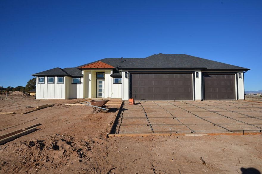 Spacious 4-bedroom, 2.5-bath single-level home offering the perfect blend of country living and modern comfort. Enjoy an open, airy layout with generous living spaces ideal for entertaining and everyday life. The large kitchen features a walk-in butler's pantry for extra storage and prep space. Relax on the covered back patio while taking in sweeping views of the surrounding landscape. With its one-level design, abundant natural light, and peaceful setting just minutes from town, this home delivers comfort, convenience, and charm in one stunning package.