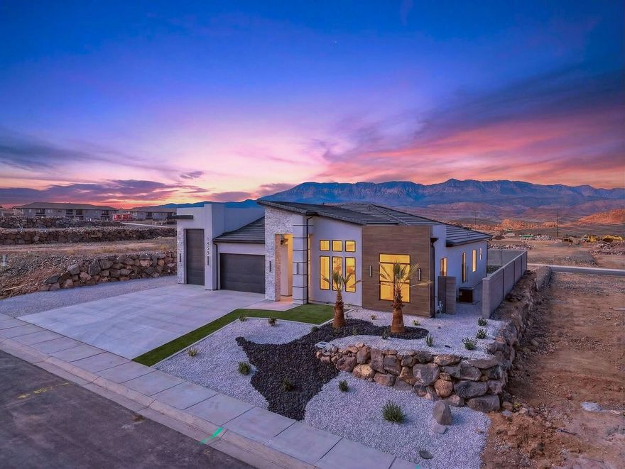 Discover luxury that's both livable and attainable in this beautifully designed 4-bedroom, 2-bath single-family home featuring stunning north-facing mountain views. With 1,861 sq ft of thoughtfully crafted living space, this home proves that luxury isn't about size--it's about quality, design, and attention to detail. Step inside to experience high-end finishes throughout, with carefully selected materials and elegant touches that elevate everyday living. The open, functional layout maximizes space while creating a warm and inviting atmosphere perfect for relaxing or entertaining. Every detail has been intentionally designed to combine comfort, style, and practicality. The property also includes an impressive 45'8'' deep garage with a 10-foot-wide door--ideal for storing boats, side-by-sides, ATVs, trailers, or other recreational toys. Enjoy the freedom of no HOA, giving you flexibility and peace of mind. Outdoor enthusiasts will love the location--just 36 miles from Zion National Park and only 11 miles from Sand Hollow State Park, offering world-class hiking, boating, off-roading, and breathtaking scenery. If you're looking for a high-end home with exceptional craftsmanship, incredible views, and access to Southern Utah's best recreation--without the maintenance or price tag of a massive home--this one checks all the boxes.