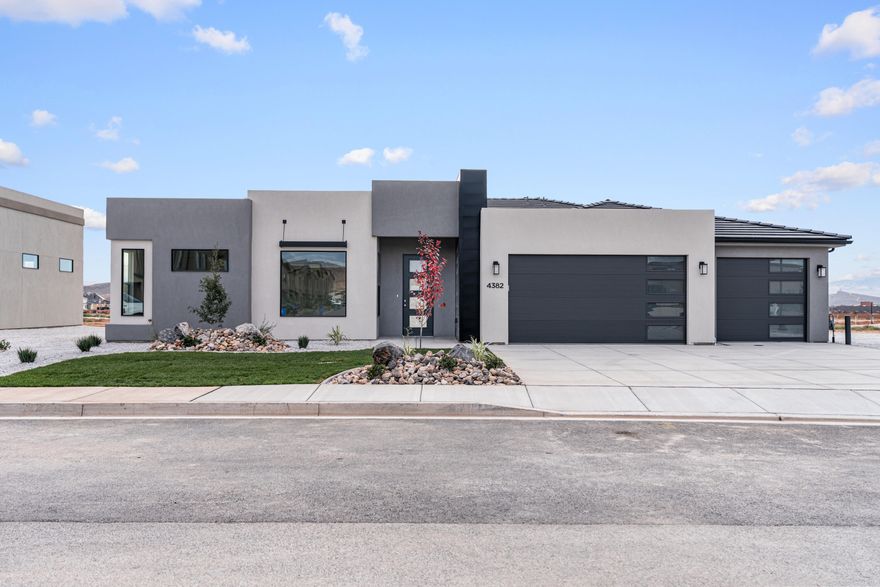 Discover this modern 4-bedroom home is perfectly designed for style and functionality. The open-concept floor plan features painted cabinets, upgraded flooring throughout, and premium countertops, creating a bright and inviting living space. The spacious 3-car garage offers ample storage, while the covered patio provides the perfect spot for outdoor relaxation or entertaining. Nestled in the desirable new Finley Farms development, this home combines contemporary finishes with the comfort and convenience of a prime location. Block Wall Included! Ask about available lender incentives. Buyer and agent to verify all information.