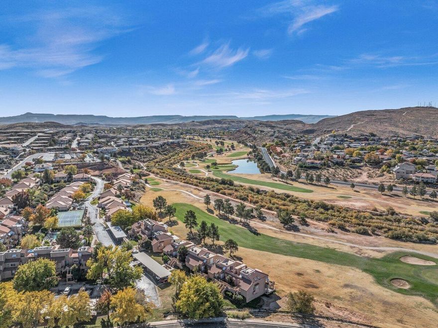 This newly updated ground-level condo at St. George Golf Club offers the perfect blend of comfort, style, and convenience! Enjoy serene golf course and mountain views right from your private patio, creating a peaceful setting for relaxing mornings and evenings. The prime location puts you close to shopping, dining, and outdoor recreation, making it easy to enjoy all that St. George has to offer. Inside, the bright and inviting layout features 2 spacious bedrooms, 2 bathrooms, and abundant natural light throughout. Residents of the Tamarack Condo Association enjoy fantastic amenities including a pool, hot tub, pickleball courts, and so much more! Buyer to verify all information, deemed reliable, however buyer to verify all info including utilities, rental restrictions, and HOA information if applicable.