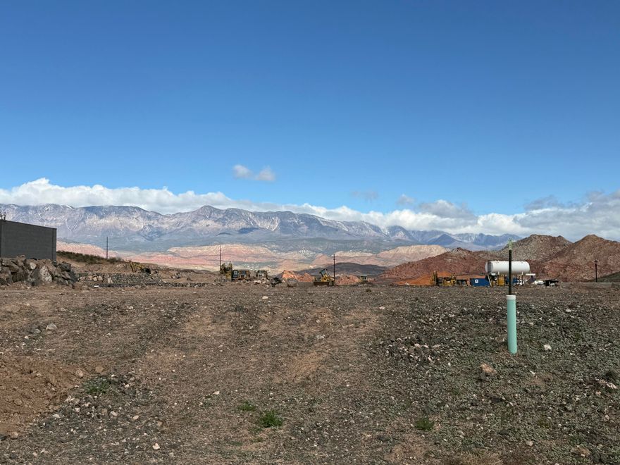 Great lot that is ready to build on with no HOA!  North/South orientation with the backyard facing North providing VIEWS of Pine Valley Mountain.  Lots behind sit lower than this lot, so the potential for protected views is higher.  Bring your own builder, or maybe even consider an owner build!  Homes have already been built on either side and across the street, so there's no guessing what might be built around you.  All utilities are stubbed in, including sewer.  Very stable pad, soils report in documents tab.