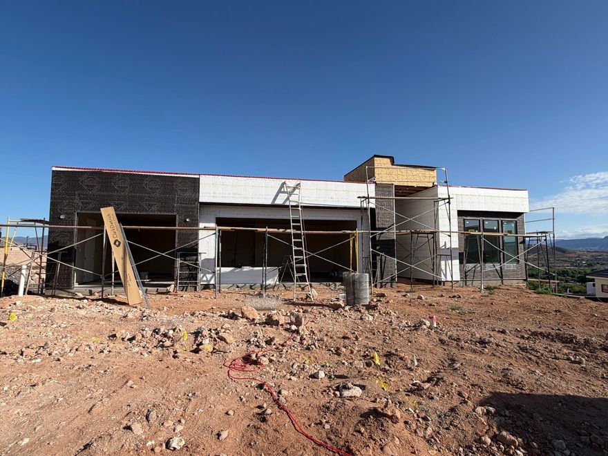 Imagine having a view from almost every window! This home sits on a special lot and is positioned to take advantage of the Southern Utah views out of almost every window. Projected date of completion is August 2026. Schedule your showing today!