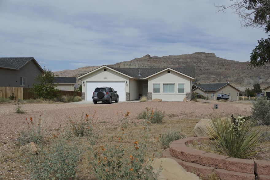 INTERIOR PHOTOS COMING SOON!  Lease with Option to Purchase Opportunity!  This lightly lived in home is now available just several miles from Amangari Resort and the Lake Powell Recreation areas.  Nice back yard area for privacy, create what you want back there!  
Seller is motivated to work with qualified buyers and or Tenants that want to eventually purchase.  If you are looking for a single family home in this area, this is an affordable newer home on a corner lot with a lot of plus's!  Call today to schedule a showing.