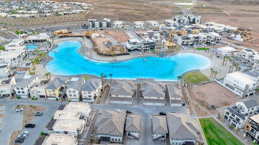 Turn-key, fully furnished vacation home in Desert Color. 3 bedrooms, 3.5 baths, open-concept main level, private third-floor sky deck. Each bedroom includes an ensuite bath. Sleeps up to 16 with two full bunk beds and two primary suites. High-end modern finishes and furnishings included.

Location within the community offers quick access to amenities: approx. 2-minute walk to the 2.5-acre swimmable lagoon, resort pool, clubhouse, cabanas, and six pickleball courts. Near trails, parks, dining, golf, and area recreation.

Highlights
- Sold fully furnished and turn-key
- Open kitchen/living/dining + powder bath on main level
- Two suites on second level; bunk room and sky deck on third level
- Sleeps 16 (configuration: two full bunk beds + two primary suites)
- Ensuite baths for for all bedrooms
- Modern finishes, stylish decor
- Short walk to lagoon, pools, clubhouse, and pickleball

Community amenities: lagoon, pools/hot tubs, clubhouse, cabanas, pickleball courts, trails, parks. Buyer to verify all information, including allowable uses, STR rules/permits, HOA fees, and square footage. Schedule showing through listing agent.