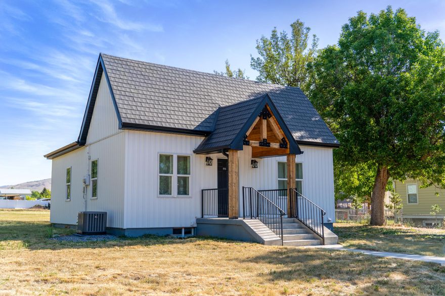 Welcome to this charming single-family home, originally built in 1920 and thoughtfully remodeled to combine vintage character with modern updates. Offering approximately 840 square feet of comfortable living space, the residence sits on a spacious 0.53-acre lot, providing ample outdoor area for relaxation and recreation. The home features a partially finished basement, ideal for additional living or storage needs. Its timeless architecture and recent updates make it a cozy and inviting place to call home.