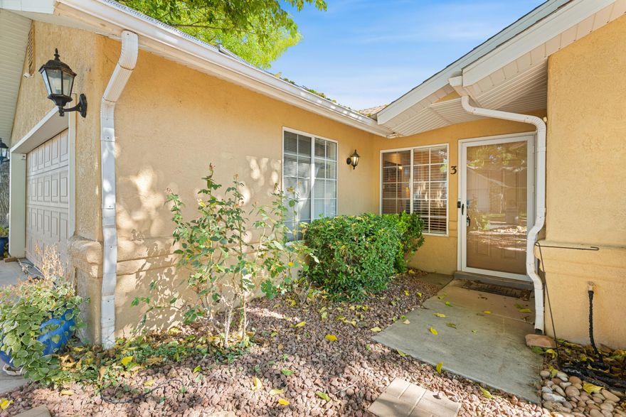 Cute, charming, and full of light, this cozy home in the popular Shadow Creek subdivision is ready to welcome you. The interior feels fresh and bright, featuring new wood flooring. The home can also be sold furnished, if you'd like to keep things simple. The backyard is a highlight - nicely sized with mature trees and plants that add privacy and shade. Located near the Tonaquint Nature Center, Tonaquint Park, Thunder Junction All Abilities Park, and Sunbrook Golf Club, this home puts recreation, relaxation, and convenience all within easy reach. Comfortable, clean, and easy to love!