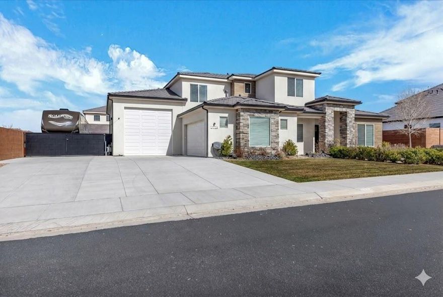 Located in the highly sought after Little Valley area, this stunning custom home in The Willows offers the total package: pool, RV garage, additional RV parking, and room for everything you need. With 4 spacious bedrooms, a dedicated office that can easily serve as a 5th bedroom, and a large upstairs loft perfect for entertaining or a second living space, this home was designed for both functionality and lifestyle. The gourmet kitchen is the heart of the home, featuring beautiful cabinetry, generous counter space, and a large walk in pantry. You will also love the thoughtfully designed laundry and mud room that keeps everything organized and tucked away. Quality construction shines throughout with 2x6 framing, Dixie Power for added efficiency, and a zoned HVAC system for year round comfort. Step outside to your private backyard retreat complete with a covered patio and heated pool, ideal for entertaining in every season. The lot still offers room to customize and add additional outdoor amenities to fit your vision.