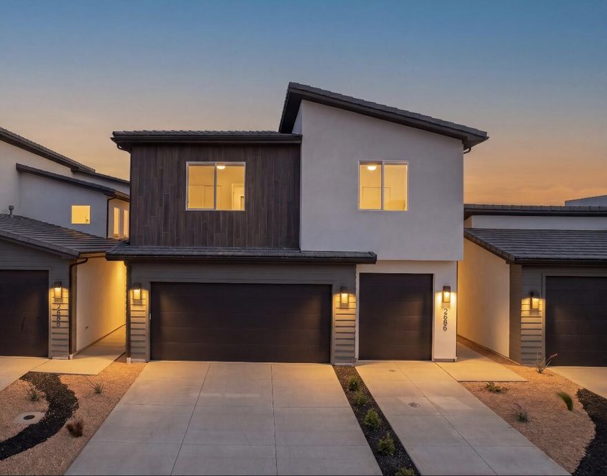 MOVE IN READY ! Postcard-perfect panoramas of Zion, Sky Mountain Golf Course, and Pine Valley Mountain greet you daily from the upstairs balcony and loft, views that sell themselves.
Inside, 20' ceilings and an elegant fireplace define the airy great room. The open layout flows effortlessly to a private courtyard, your personal outdoor escape.
Chef's kitchen shines with GE Profile appliances, quartz counters, and soft-close cabinets. Instant hot water via tankless recirculation.
Main-floor primary suite: zero-entry tile shower + soaking tub.

Come see the views. Stay for the lifestyle.