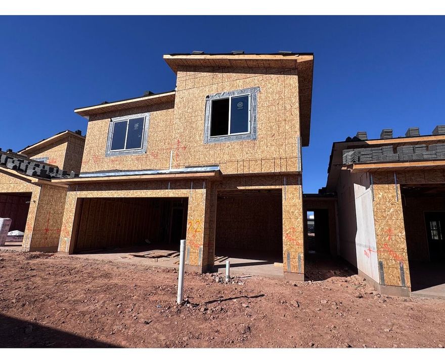 Postcard-perfect panoramas of Zion, Sky Mountain Golf Course, and Pine Valley Mountain greet you daily from the upstairs balcony and loft, views that sell themselves.
Inside, 20' ceilings and an elegant fireplace define the airy great room. The open layout flows effortlessly to a private courtyard, your personal outdoor escape.
Chef's kitchen shines with GE Profile appliances, quartz counters, and soft-close cabinets. Instant hot water via tankless recirculation.
Main-floor primary suite: zero-entry tile shower + soaking tub.

Come see the views. Stay for the lifestyle.