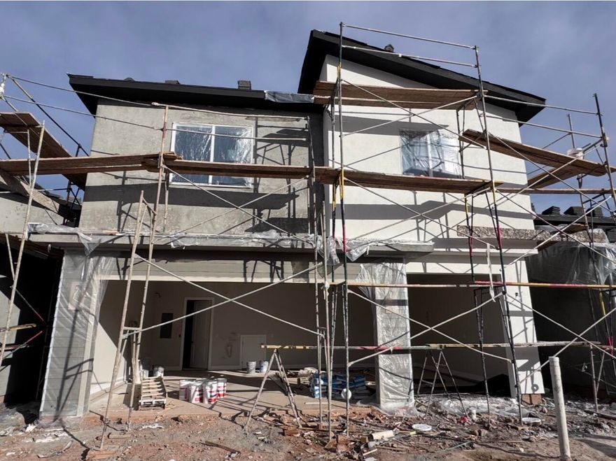 Postcard-perfect panoramas of Zion, Sky Mountain Golf Course, and Pine Valley Mountain greet you daily from the upstairs balcony and loft, views that sell themselves.
Inside, 20' ceilings and an elegant fireplace define the airy great room. The open layout flows effortlessly to a private courtyard, your personal outdoor escape.
Chef's kitchen shines with GE Profile appliances, quartz counters, and soft-close cabinets. Instant hot water via tankless recirculation.
Main-floor primary suite: zero-entry tile shower + soaking tub.

Come see the views. Stay for the lifestyle.