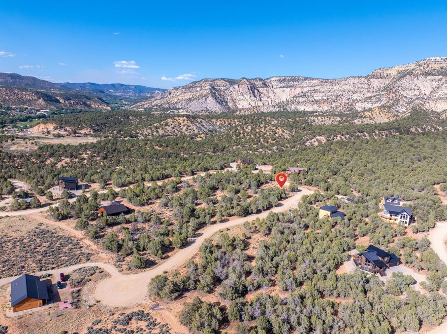 Tucked on a hill above Orderville, in Quarter Circle H Ranch, this lot is well-suited for anyone who wants to be in a small town, but still have daily amenities not far away.  Located along Highway 89, Orderville is not far from Zion National Park (east entrance), Bryce Canyon National Park, Grand Staircase-Escalante National Monument, and just a bit farther from Grand Canyon National Park and Lake Powell.  Kanab is the closest 'major' town.  All wet utilities are hooked up, and sewer, water and electrical are stubbed to the lot.
