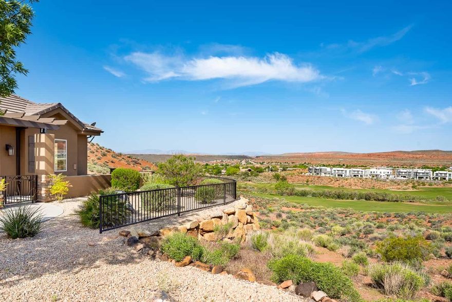 Tucked away at the very end of a quiet dead-end street, this single-level end unit offers privacy, abundant guest parking, and some of the most breathtaking views in the entire subdivision. With no rear neighbors, the home backs to open space and Coral Canyon Golf Course. Enjoy views of the Red Cliffs Desert Reserve and Pine Valley Mountain, paired with unforgettable sunsets.

As a turnkey investment, this property is a high-performing nightly rental w/ documented financials. Ideal for investors seeking a reliable income-producing property or buyers looking for a flexible second home with consistent demand, this is a rare combination of views, privacy, single-level living, and performance that simply can't be replicated. Tucked away at the very end of a quiet dead-end street, this exceptional single-level end unit offers rare privacy, abundant guest parking, and some of the most breathtaking views in the entire subdivisionall with no stairs for easy, accessible living. With no rear neighbors, the home backs to open space and Coral Canyon Golf Course, creating a peaceful buffer between the private back patio and the fairways beyond.

From the north-facing vantage point, enjoy sweeping views of the Red Cliffs Desert Reserve and Pine Valley Mountain, paired with unforgettable sunsets that light up the sky. Located on what is widely considered the quietest street in the community, this home also boasts some of the most desirable views in the entire area.

As a turnkey investment, this property truly stands apart. It is a proven, high-performing nightly rental with strong rental history and documented financialsan opportunity that is exceptionally rare at this price point, especially when paired with these views and a single-level layout. The well-maintained end unit enhances privacy and long-term value, while the private outdoor patio and personally owned hot tub create an inviting retreat for guests and owners alike.

Ideal for investors seeking a reliable income-producing property or buyers looking for a flexible second home with consistent demand, this is a rare combination of views, privacy, single-level living, and performance that simply can't be replicated.