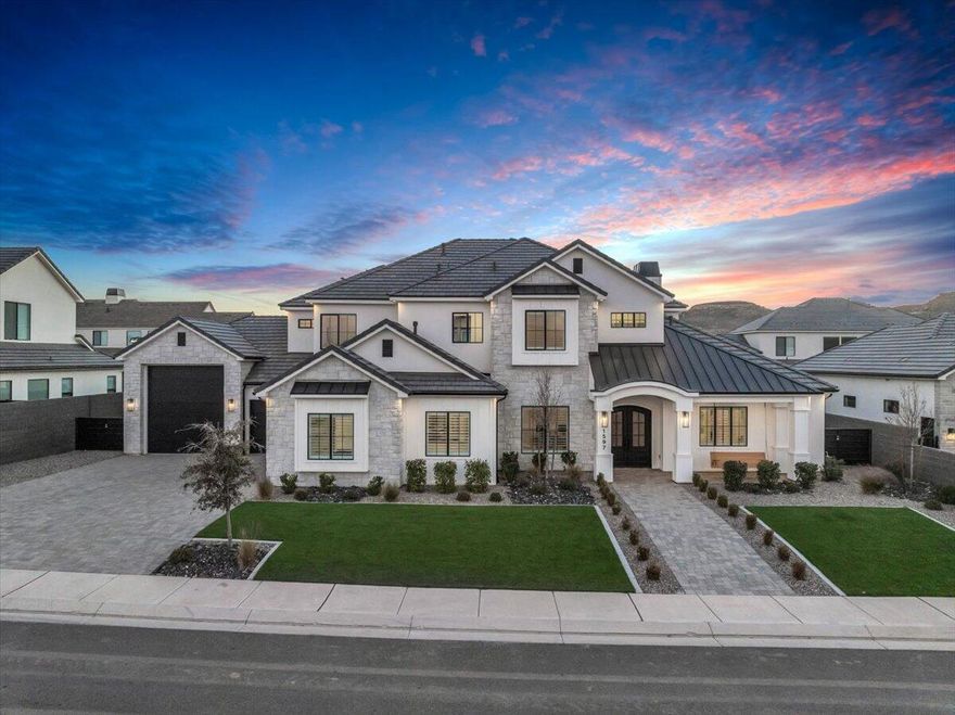 Barely lived-in home in Tonaquint Cove that feels brand new. Each bedroom features its own ensuite bathroom for privacy and convenience. The 5-car garage offers an extra-deep bay with RV/boat height clearance and epoxy flooring. Backyard is designed for entertaining with a massive pergola, fireplace, private pool, and hot tub.  Open, modern interior with high quality finishes throughout. All furnishings are negotiable!