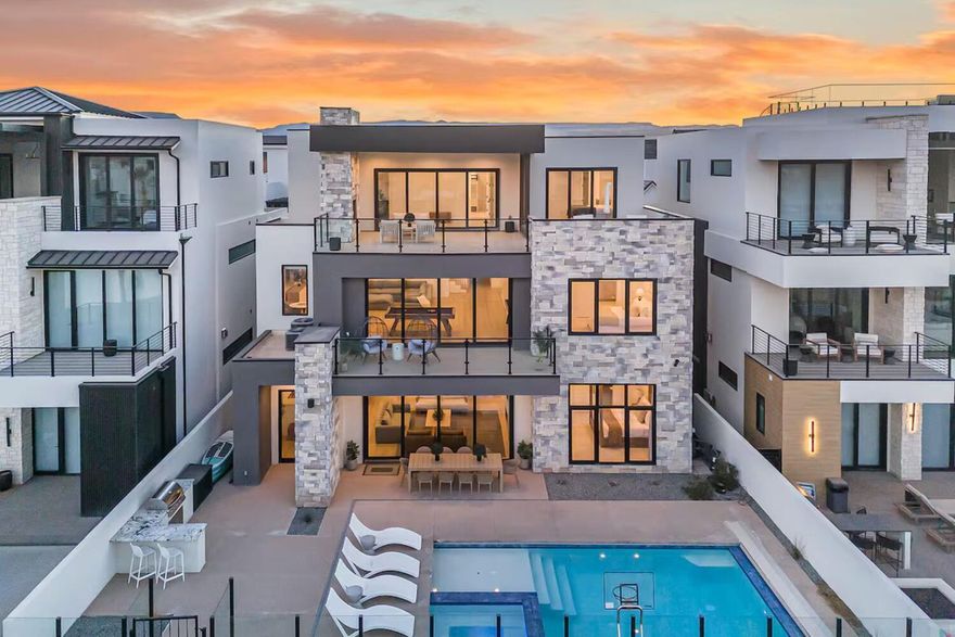 Exclusive Beachfront Co-Ownership on the Desert Color Lagoon - 1/13 share (28+ days annually) 7 Bedrooms | 7.5 Bathrooms | Nearly 6,000 Sq Ft | Private Pool + Hot Tub | Sleeps 28+ Welcome to The Palm—the most private beachfront home on the stunning Desert Color Lagoon in St. George, Utah. Take advantage of a rare opportunity to own a piece of this extraordinary shoreline. Spanning nearly 6,000 square feet across three spacious levels, this impeccably designed residence offers luxury, comfort, and entertainment on an unmatched scale. Every inch of this home is thoughtfully curated—from expansive bunk rooms and open-concept living spaces to panoramic lagoon views that captivate from sunrise to sunset. Step outside to your private pool and hot tub, or walk straight onto the sand for paddleboarding, kayaking, or simply relaxing by the crystal-clear waters of the lagoon. Inside, you'll find game tables, gaming consoles, and spacious common areas perfect for entertaining. Fire up the BBQ grill and gather with friends and family in the outdoor lounge areas for unforgettable evenings under the stars.

Don't miss your chance to own this beachfront paradise, where luxury meets lifestyle at a fraction of the cost.