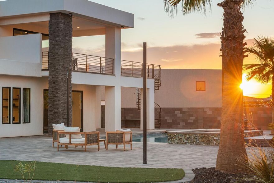 Whether you are playing on the championship greens, ATVing on sand dunes or recreating at the lake or the beaches at Sand Hollow State Park, or in your own back yard.   This home is an entertainer's dream with it's large patio and view deck, large covered pool/whirlpool spa, your private sports court, this home has it all!   Luxury and comfort abound in this open concept 4 bedroom, + office,  3.5 bath, 3 car garage.. Very attractive financing options available.