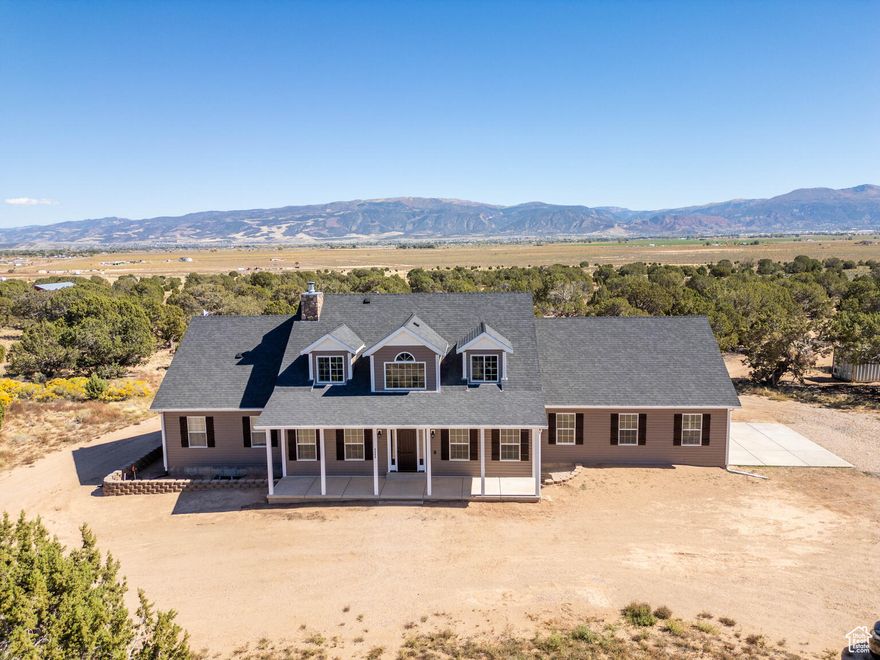 Huge Price Reduction. Discover 4680 N 4500 W, Cedar City-a secluded 20-acre property hidden from the main road yet minutes from Three Peaks Recreation Area. Inside, this stunning property boasts an oversized loft, dining room, living room and a spacious kitchen with a walk-in pantry and granite countertops. Enjoy movie nights in your private theater room and stay active with a fully equipped home gym. The open-concept living areas create a warm and inviting atmosphere, ideal for both daily living and entertaining. Connected to city water and power. Septic and Propane.