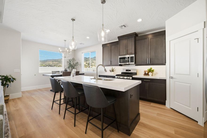 Fully fenced with gates, blinds and refrigerator included, this home is truly turn-key ready! Step inside to a warm and inviting living space featuring a cozy fireplace with custom cabinetry, an open layout, and a spacious dining area ideal for both everyday living and entertaining. The kitchen is thoughtfully designed with ample cabinetry and a convenient pantry for added storage. Enjoy outdoor living on the covered back porch, perfect for hosting guests, while the fully fenced yard offers privacy and space to relax. This home includes three bedrooms, two bathrooms, and a generous three-car garage. An additional upgrade includes an electric vehicle charging plug in the garage. This darling home is ready for you to move in and make it your own. Owner/Agent.