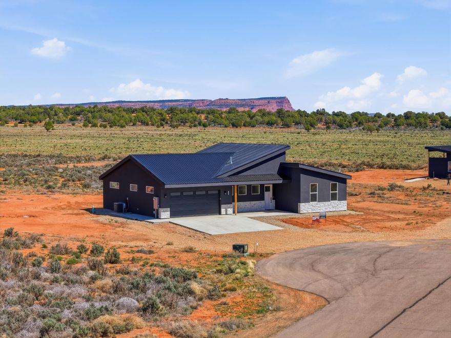 Walk into Equity! Home recently appraised at 725K. This 4BR/3BA home with 1BR/1BA detached casita sits on 2.34 acres in Kanab, UT -- and is short-term rental approved. Offset the mortgage payments with a healthy rental income or make it your oasis. Vaulted ceilings in the kitchen & living room create an airy, light-filled space. Perfect basecamp for exploring: Zion NP (30 mi), Lake Powell (75 mi), Grand Canyon North Rim (80 mi), Bryce Canyon (80 mi). Room for RVs, toys, pickleball courts and outdoor living. Live, rent, and adventure from your own slice of the Southwest!