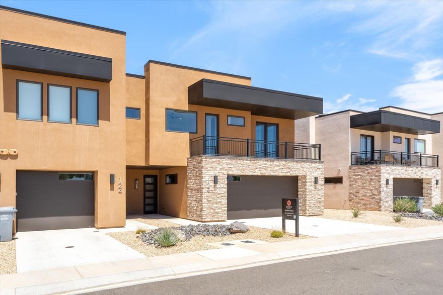 Experience elevated desert living in this stunning Hillcrest townhome at the The Ledges of St. George. Offering 4 spacious bedrooms and 4.5 baths, this beautifully designed residence features upscale finishes including waterfall-edge quartz countertops, expansive multi-slide doors, and an upstairs loft perfect for entertaining or relaxing with guests. Enjoy breathtaking views of Snow Canyon State Park and Fish Rock, all while being just steps from The Ledges Golf Club.

Residents and guests will love the exceptional community amenities, including a large resort-style pool and hot tub. Offered partially furnished, this townhome is ideal as a primary residence, vacation retreat, or investment opportunity in one of St. George's most sought-after communities.