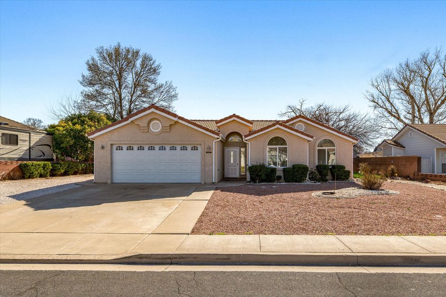 Come take a look at this great single level home, with a practical floorplan, RV PARKING WITH DUMP & in one of the most convenient areas in Hurricane.  This home is close to the movie theater, High School, shopping and restaurants.
The home has had recent improvements, with all new plumbing inside the home, new faucets, new toilets and a new water heater.  
The BACKYARD IS SPACIOUS, PRIVATE and ready to enjoy with an awning and tool shed included.
One really nice feature is the large RV parking spot on the side of the home with a RV dump that is tied into the city sewer. Water and power are close by as well for long term RV use on the property.
This home is a perfect starter home or investment property with NO HOA.  Home is unoccupied and easy to show.