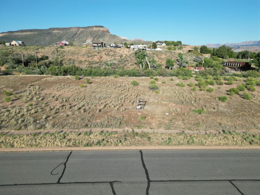 New Phase Release Premium 1 plus acre lots now selling from our brand new sales office at Sierra Bella in Virgin Utah. Just minutes from the gates of Zion National Park. This is your opportunity to own a slice of Southern Utah Paradise! These fully improved lots offer sweeping views of the iconic Zion Mesas and a rare rural residential setting perfect for your custom dream home. With approved builders ready to go, you can start building right away. Each lots includes one share of pressurized irrigation water in addition to the culinary tap. ACT NOW prices start at $235,000.00 Washington County Water Conservancy Impact Fees have been paid on al lots. All information deemed reliable buyer .... buyer to verify.