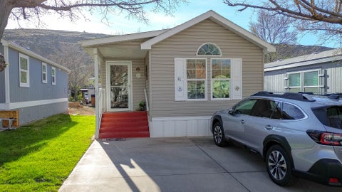 Photo of 61 COTTONWOOD LN, Harrisburg, UT 84737 (MLS # 26-275638)