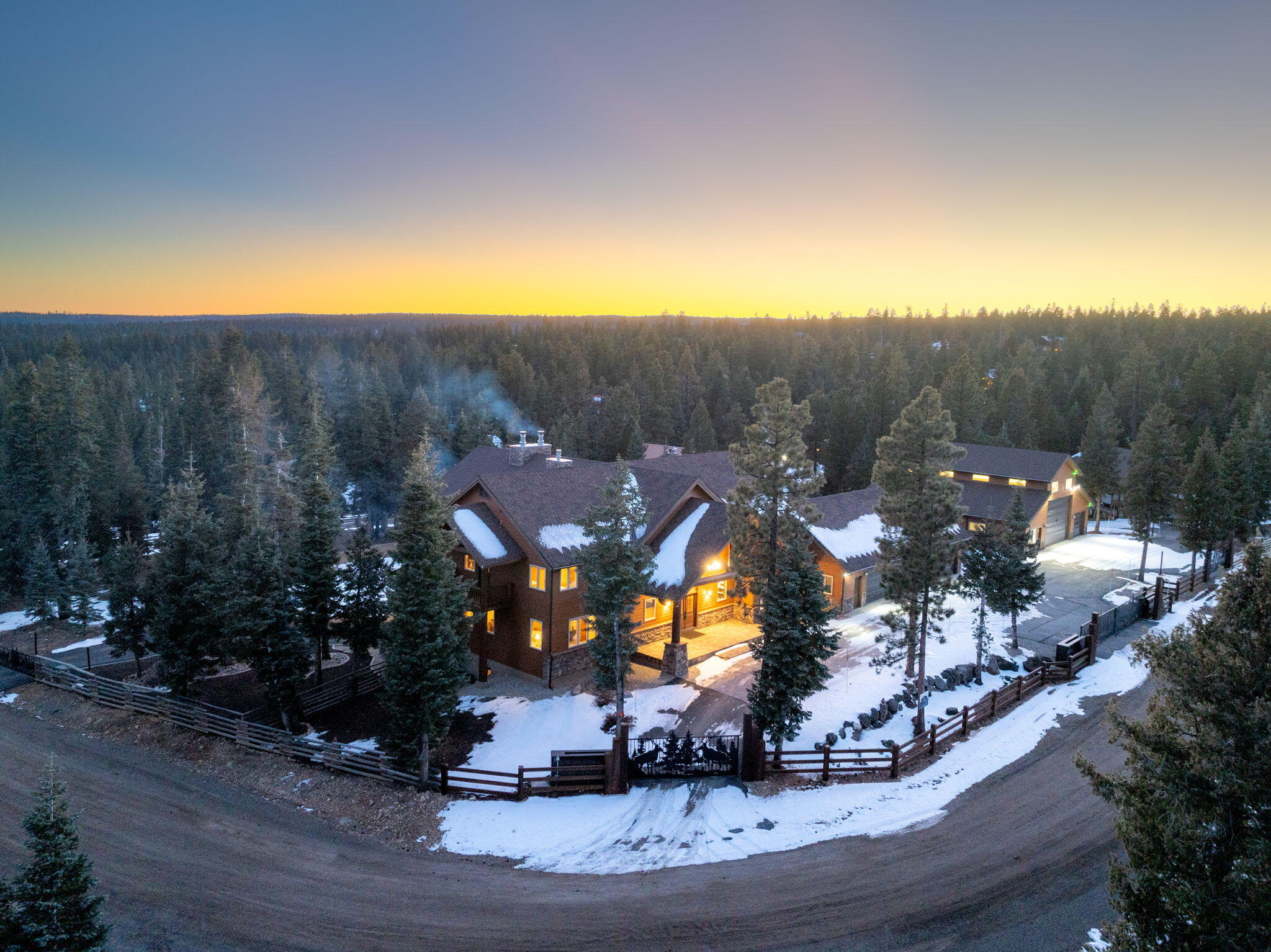 This truly rare listing is finally available for those who seek the pinnacle of luxury living. Nestled on over 2.5 acres of pristine land, this 10,000-square-foot masterpiece seamlessly blends rustic elegance with modern sophistication, creating an unparalleled retreat. Every detail of this estate has been thoughtfully crafted to impress. With a total of seven ensuite bedrooms, each offering privacy and luxury, there's room for everyone to relax in comfort. Additionally, the property includes two separate mother-in-law apartments, each featuring a private bedroom, kitchenette, and living room-perfect for extended family, guests, or private retreats. Car enthusiasts will appreciate the three expansive garages, capable of housing up to 25 vehicles, making it a collector's dream. The proper Whether you're seeking a retreat for unforgettable gatherings, a secure and serene getaway, or simply the perfect
 fusion of elegance and functionality, this luxury cabin is the answer. From the soaring ceilings to the carefully curated finishes, every inch of this estate has been designed to exceed expectations. Come experience the art of mountain living in a way that only this
 property can deliver. Don't let this extraordinary property slip away. Schedule your private tour today and discover what makes this luxury cabin one of the most sought-after listings on the market!