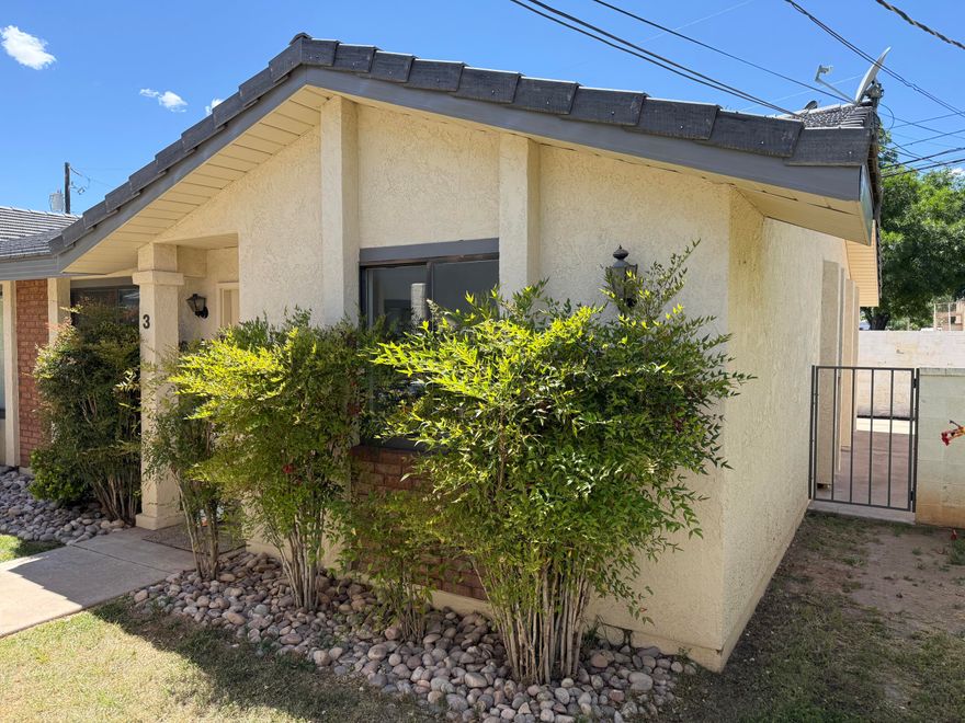 Fully remodeled and tucked in a quiet corner of Downtown St. George you will find this end unit townhome that has been completely renovated. The building has a brand new roof, new paint/stucco, and an impeccable yard. With a relaxed HOA, mature trees, no back yard neighbors, and walking distance to anything you need downtown this 2 bed, 2 full bathroom home is perfect for just about anyone. A new HVAC, water heater, countertops, all new flooring and paint, fixtures, and faucets will provide significant peace of mind for years to come. One of two end units with a fully fenced back yard and a side yard adds value and extra space. The home also backs up to two quiet office buildings that are always empty on the weekends. Walk to shopping, restaurants, Utah Tech, parks, pickleball courts, and town square. Call now for a showing owner/ agent.