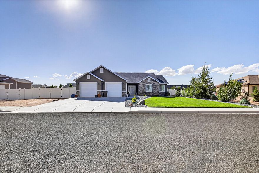 Built in 2018, this 4 bedroom, 2 bath home offers 2,105 sq. ft. of thoughtfully designed living space on a spacious .44-acre lot. The open layout is enhanced by wide hallways for easy accessibility and luxury vinyl flooring throughout the entire home. In the living room, a cozy gas fireplace creates the perfect spot to gather and unwind. The kitchen and living areas flow seamlessly to the back patio, which is already stubbed with a gas line, ideal for outdoor grilling and entertaining. 
The primary suite features a double vanity, while the entire home (and even the garage) has double insulation for year-round comfort and efficiency. A tankless water heater adds modern convenience. Outdoors, enjoy a fully fenced backyard with gated access on both sides of the home, ideal for RV parking or additional storage. Fruit treesincluding apple, peach, and plumadd charm and function to the landscaped yard. The 2-car garage provides plenty of space, while the large lot gives you room to grow and enjoy. This move-in ready home blends modern comfort, thoughtful design, and outdoor appealall in one inviting package.