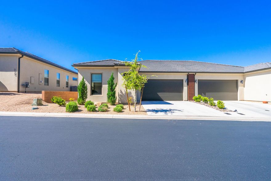 Tucked away in a highly desirable 55+ community, this nearly new home offers the perfect blend of style, comfort, and convenience. Enjoy a serene private backyard retreat with a spacious covered patio—ideal for relaxing or entertaining. Inside, you'll find real hardwood floors, light and airy color palettes, and an open-concept layout that feels fresh and modern. Located in a vibrant and growing area, you're just minutes from shopping, dining, and everyday essentials. This is low-maintenance living in an ideal location—ready for you to move in and enjoy.