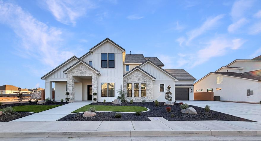 This home showcases 3,979 sq ft of sophisticated design and expansive living space in a highly desirable setting across from George Washington Academy and just 1.4 miles from the Red Cliffs Temple. This impressive 6-bedroom, 4.5-bath residence balances comfort and elegance with a thoughtfully crafted floor plan ideal for gathering and entertaining. Highlights include a butler's pantry, convenient laundry hookups within the primary closet, pool and water softener pre-plumbing, artificial turf for polished curb appeal, and full cable wiring throughout. A builder warranty is included, providing added assurance and long-term confidence.