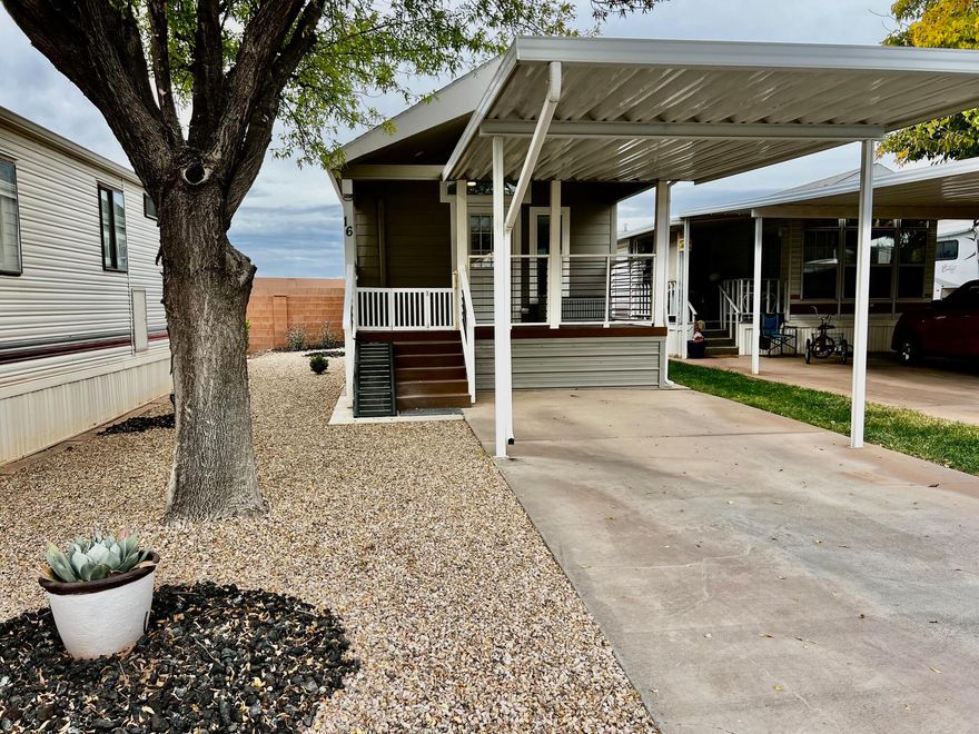 Classy 5-Year Park Model Home!
This classy, exceptionally maintained park model offers modern comfort with timeless style. Featuring upgraded appliances, a farmhouse sink, Corian countertops in both the kitchen and bath, and an attractive tile backsplash, this home feels fresh and move-in ready.
Enjoy the efficiency of an on-demand water heater, two mini-splits, and a water softener, plus the convenience of a lovely stackable washer and dryer. The beautiful walk-in shower, abundance of natural light with efficient window shades, and thoughtful design details make the interior warm and inviting.
Step outside to a comfortable front deck with durable Trex flooring, a covered carport, and a large storage shed. Move in immediately and enjoy classy, low-maintenance living in style. Buyer to verify all information.