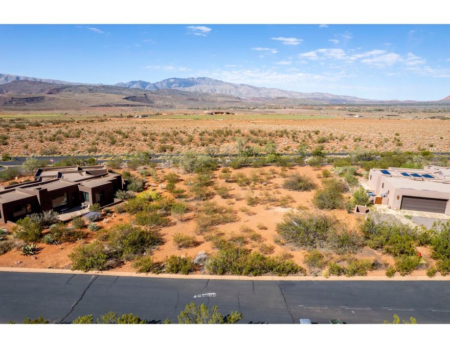 Exclusive Kayenta lot, Ivins, UT. Immerse in tranquility on this premium .41-acre land, where luxury meets artistry. Nestled discreetly among red rock canyons, each homesite harmonizes with nature, offering peace, privacy, and panoramic views. Embrace Kayenta's upscale, creative spirit—a haven for discerning buyers. Your canvas awaits in Utah's most picturesque landscape. A true masterpiece in the desert! *Washington County Water Conservancy District Fee paid!*