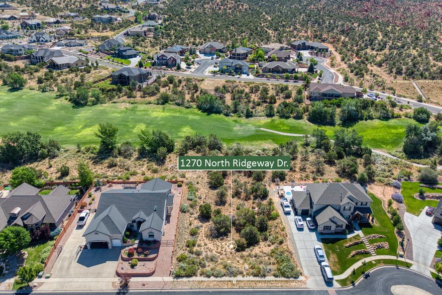 Nestled in a picturesque setting, this lot provides stunning views of the surrounding mountains. This exquisite .30-acre lot in the Canyon Ridge Subdivision, offers the perfect canvas for your dream home, combining natural beauty with modern amenities. Backing up to a well-maintained golf course, this lot offers easy access to leisurely rounds of golf, making it an ideal location for golf enthusiasts.