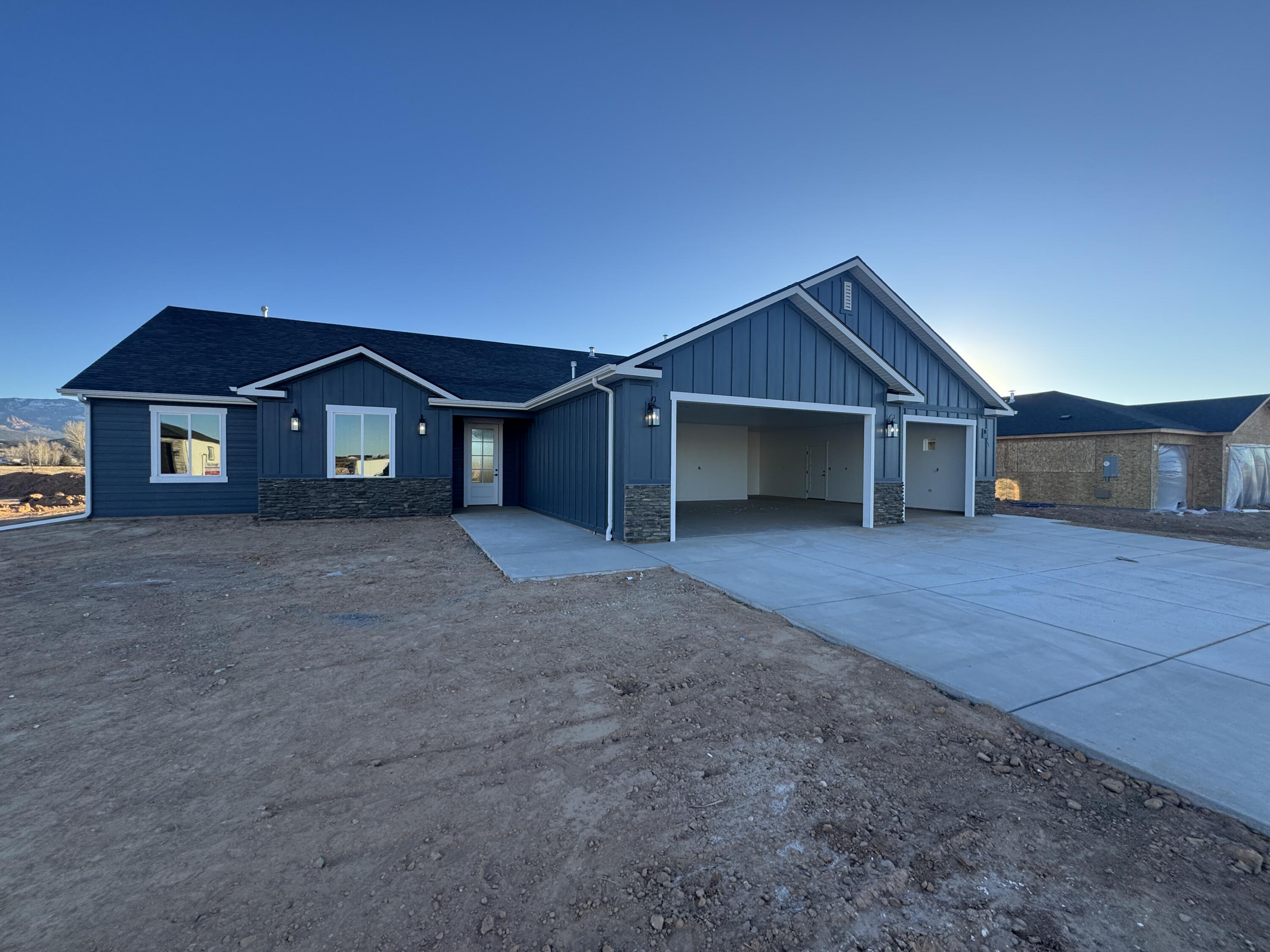 Welcome to this charming brand-new home in the Newly developed Iron Crest subdivision! Spanning just over 2,000 sq. ft., this thoughtfully designed 4-bedroom, 2-bathroom home offers exceptional quality and modern finishes throughout.

Step inside to find luxury vinyl plank (LVP) flooring and board-and-batten accents, creating a stylish, high-end feel that sets this home apart from typical spec builds. The spacious layout features an open-concept living area, a well-appointed kitchen with a refrigerator included, and ample space for your family and guests.

The large 3-car garage and dedicated RV parking provide convenience for all your storage needs. This home offers a perfect blend of country charm and modern living. Enjoy the benefits of a custom feel without the hassle of building from scratch. Expected completion is Middle of February 2025, so don't miss your chance to make this exceptional home your own!