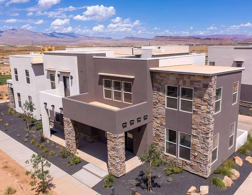 Live where it feels like a vacation every day!
Our popular Verona plan features soaring 20 ft ceiling with large windows, filling the home with beautiful natural light. Stylish modern selections, private courtyard, front porch, deck off primary bedroom, large 2 car garage with circle driveway. Step outside your door to the neighborhood park. New community pool going in soon. Resort style living includes 2.5 acre lagoon, pickleball courts, walking trails, pools, & more. Come and live the dream in Desert Color!